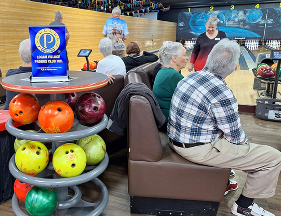 Members enjoying the chance to score well at 10-pin bowling